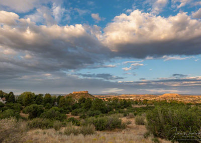 Blue Skies High Dramatic White Clouds over Castle Rock Colorado at Sunrise