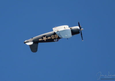 In-flight acrobatics of Brewster F3A Corsair at Pikes Peak Airshow in Colorado Springs