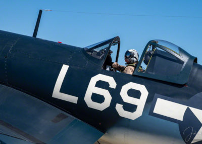 Close of Photo of Pilot in Brewster F3A Corsair Taxing on Runway