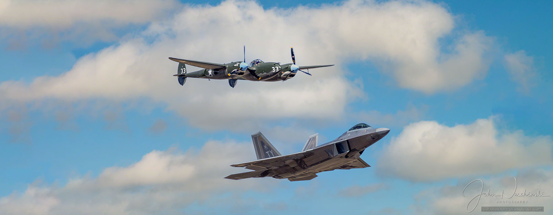 Heritage Flight Photos of USAF F-22 Raptor and P-38 Lighting