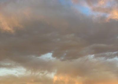 Dramatic Clouds Enfold of Castle Rock Colorado at Sunrise