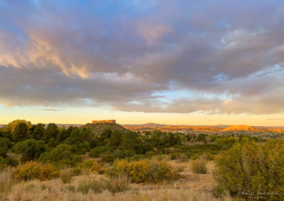 First Light Illuminates The Rock at Sunrise in this Photo of Castle Rock Colorado