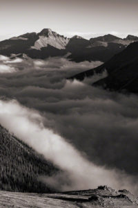 Vertical Black and White Photo of Longs Peak & Glacier Gorge with Fog in Valley Below