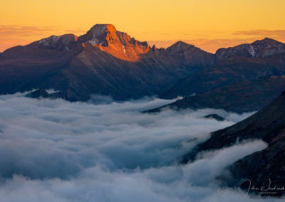 Yellow Orange Sunset Photo of Longs Peak with Fog & Clouds in Valley Below