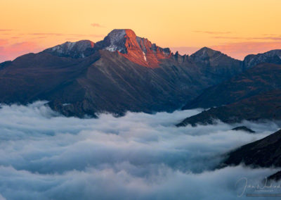 Orange Pink Sunset Photo of Longs Peak with Fog & Clouds in Valley Below