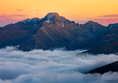 Yellow Pink Sunset Photo of Longs Peak RMNP with Layers of Fog in Valley Below