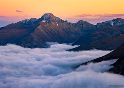 Pink Yellow Magenta Sunset Photo of Longs Peak RMNP with Layers of Fog in Valley Below