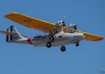 In flight photo of the amphibious Consolidated PBY Catalina
