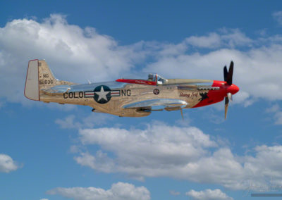Profile in Flight Photo of P-51D Stang Evil at Pikes Peak Regional Airshow