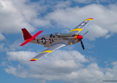 Photo of The CAF Red Tail Squadron’s P-51C Mustang, named Tuskegee Airmen in Flight