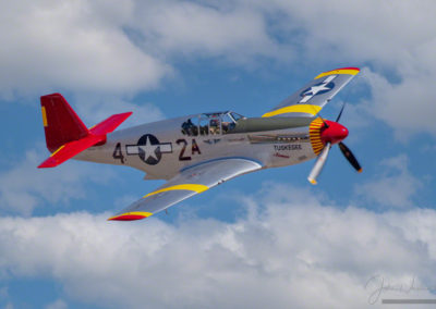 The CAF Red Tail Squadron’s P-51C Mustang, Tuskegee Airmen in Flight at Colorado Springs Airshow