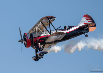 Close Up of Kyle Franklin Dracula Custom Biplane Flying at Colorado Springs Airshow