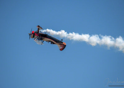 Close Up of Kyle Franklin Dracula Biplane Flying Inverted at Colorado Springs Airshow