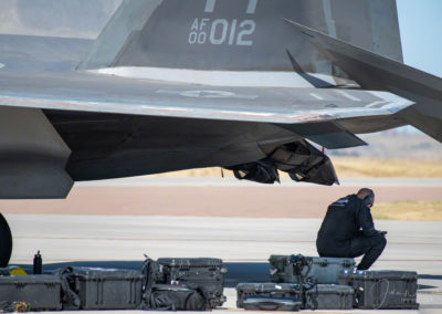 F-22 Providing Shade for Ground Crew on a Hot September Day