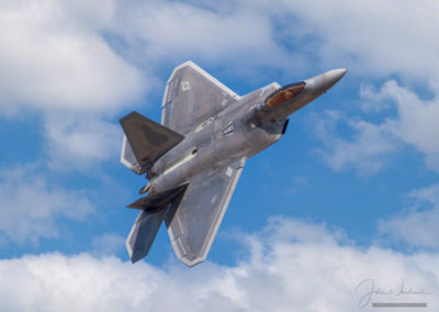 Canopy and Topside of F-22 visible in Tight Turn during a Flyby