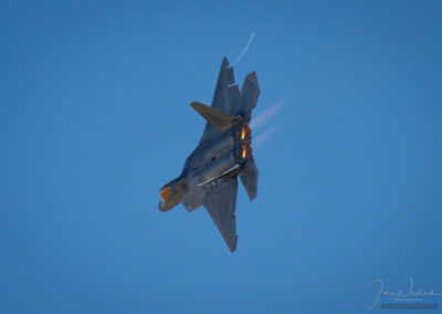 Afterburners Visible on F-22 Raptor in Tight Horizontal Turn at Airshow