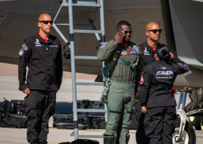 Lt. Col. Paul “Loco” Lopez being Received by Team Salutes after F-22 Flight