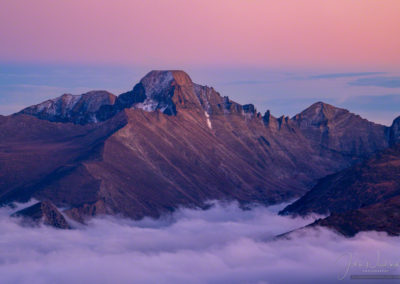 Pink Magenta Post Sunset Glow Photo of Longs Peak with Layers of Fog in Valley Below - RMNP Colorado