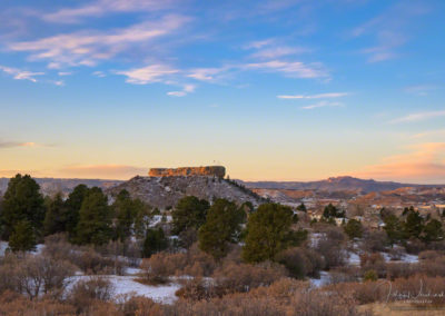 Pastel PinkClouds and Blue Skies with Kiss of First Light on the Rock - Castle Rock CO