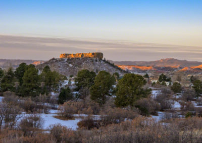 Snow and Beautiful First Light of Sunrise on the Rock in Castle Rock CO