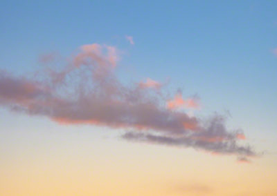 Vertical Photo of Blue Skies, Pink and Orange Clouds over Castle Rock in Autumn