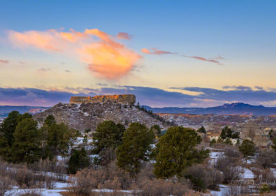 Stray Orange Pink Cloud over the Rock as First Light Illuminates at Sunrise Castle Rock CO