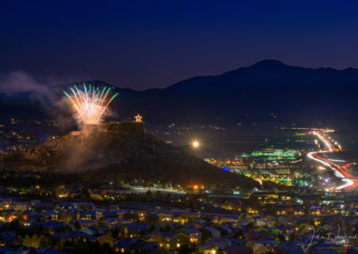 Fireworks over Castle Rock Colorado with Pikes Peak in Background at the Annual Starlighting Ceremony