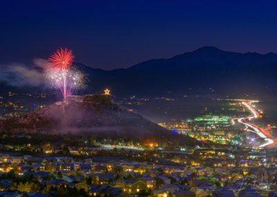 Stunning Fireworks over Castle Rock Colorado with Majestic Pikes Peak in Background at the Annual Starlighting Ceremony