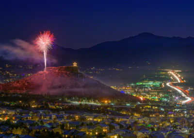 Beautiful Fireworks over Castle Rock Colorado with Majestic Pikes Peak in Background at the Annual Starlighting Ceremony