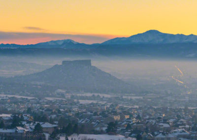 Wide Panoramic Photo of Castle Rock and Pikes Peak with Haze and Fog