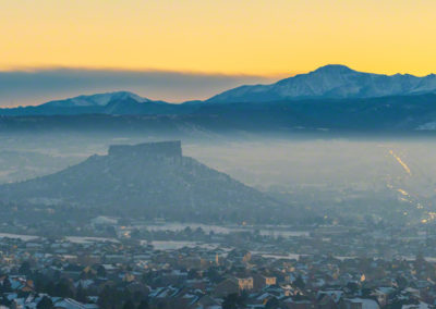 Panoramic Sunset Photo of Castle Rock Valley and Pikes Peak with Haze and Fog
