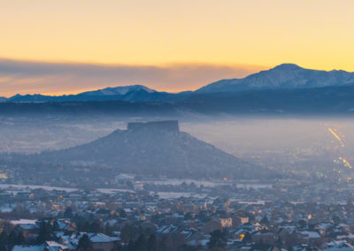 Dusk Photo of Town of Castle Rock and Pikes Peak with Haze and Fog