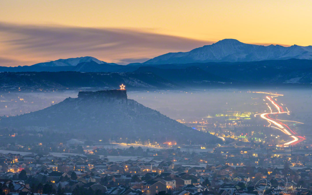 Photos of Illuminated Castle Rock Star and Pikes Peak Above the Fog