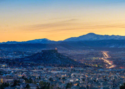 Evening Panoramic Photo of Castle Rock Colorado Valley and Pikes Peak with Cars on I-25