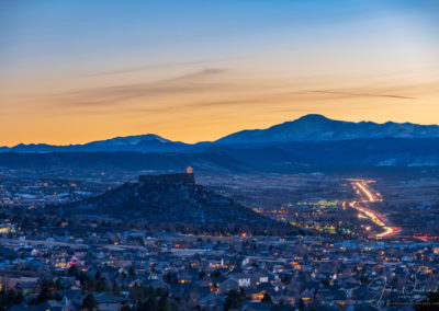 Blue Hour Photo of Castle Rock Colorado Valley and Pikes Peak with Cars on I-25