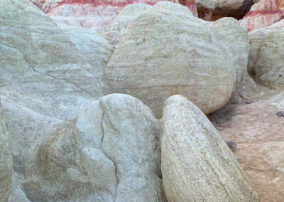 Erosion creates incised gullies and exposed layers of selenite clay and jasper at Colorado Paint Mines