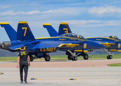 Crew Member looking on as the Jets Taxi for their Flight