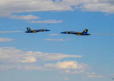 Photo 1 of Two Blue Angel F/A-18s Opposing Pass