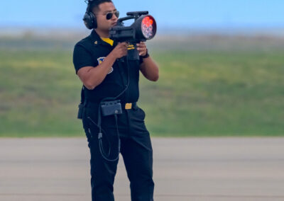 Team Member using Signal Gun to Give Jet's a Center Line for Their Maneuvers