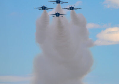 Photo of Blue Angel F/A-18s in Line - High Pass over Flight line