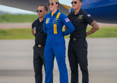 Lieutenant Commander Amanda Lee and her Ground Crew Standing at attention on Flight-line