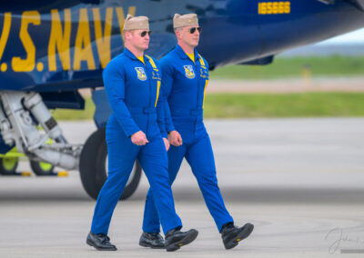 Blue Angle Pilots make their ceremonial walk from jet to jet