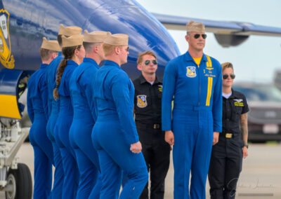 Blue Angle Pilots join the flight leader in their ceremonial walk from jet to jet